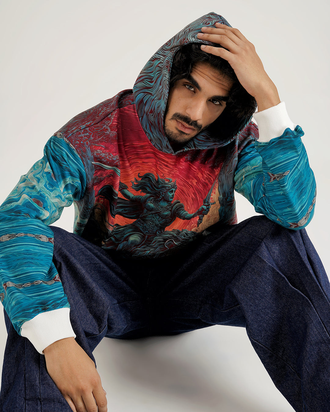 Winter 2025 Collection featuring a model in a colorful artistic hoodie, showcasing Clazzey's December Drip.