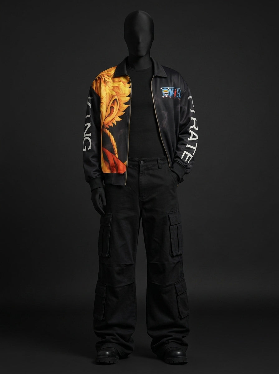 Full-length mannequin wearing open black jacket with orange anime print, black cargo pants and chunky black boots