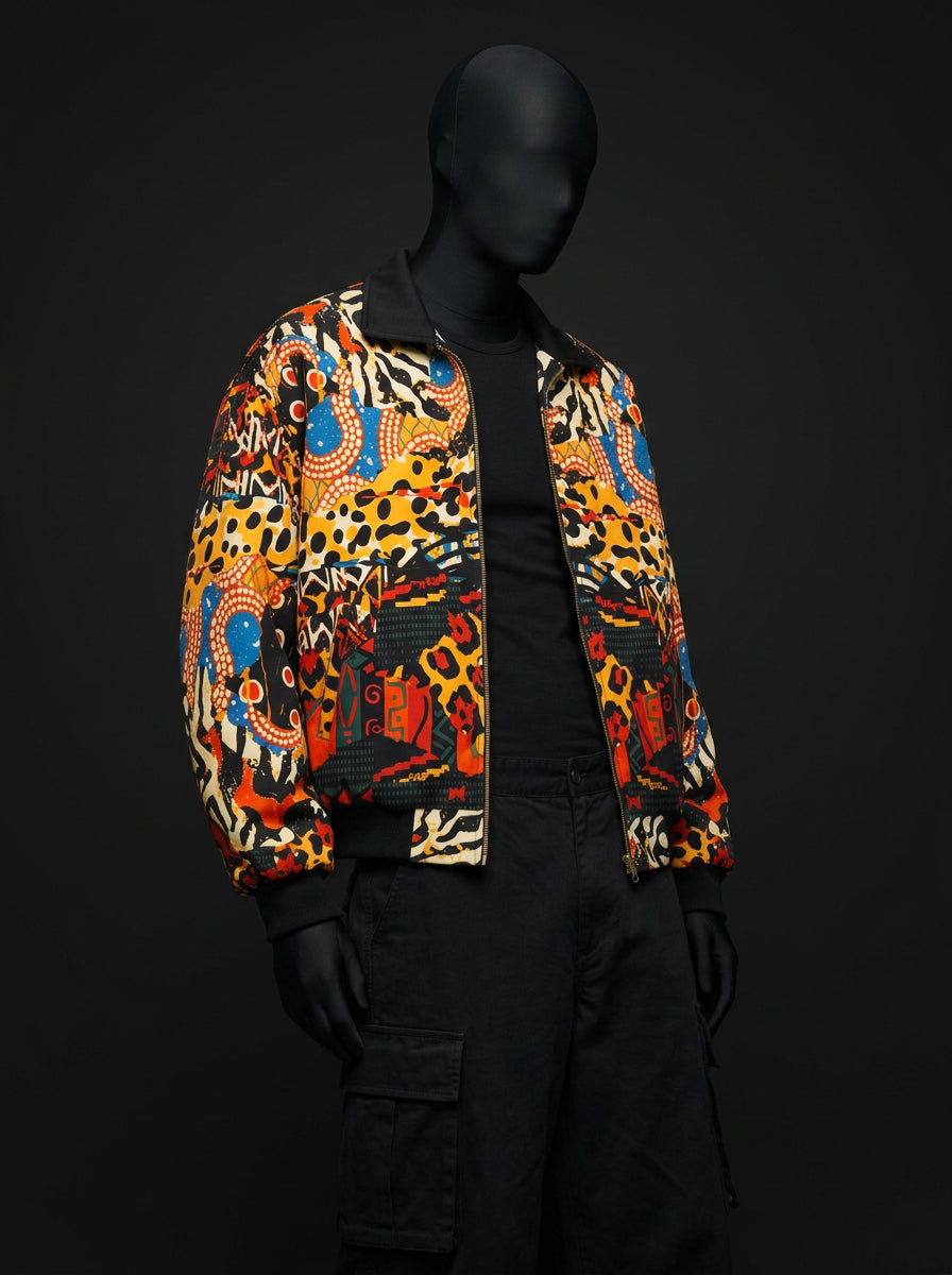 Three-quarter view of open zip-up jacket in orange, blue and black abstract print on mannequin