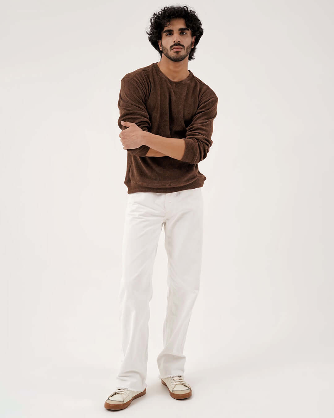 Daily Luxe Jacquard Sweatshirt – Chestnut Brown worn by a model with white pants.