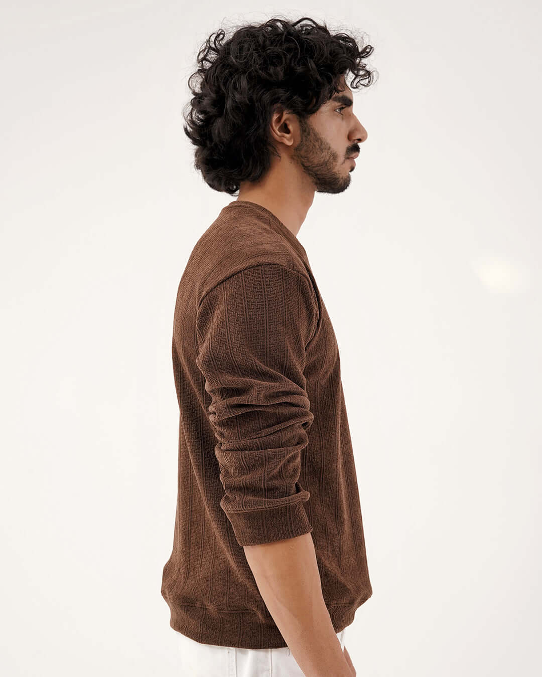 Daily Luxe Jacquard Sweatshirt – Chestnut Brown side view model wearing the premium sweatshirt in a warm brown tone.