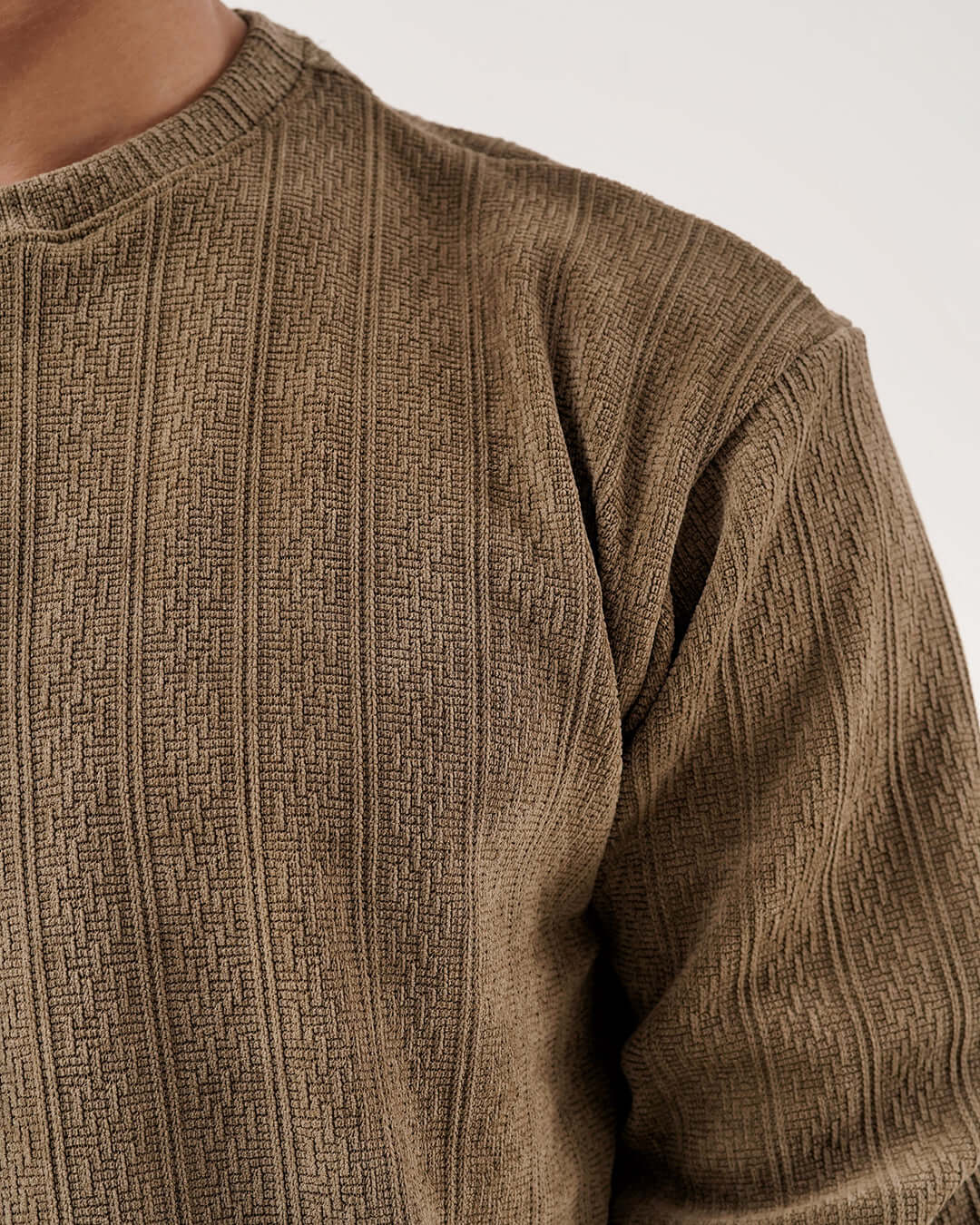 Close-up of the Daily Luxe Jacquard Sweatshirt in Olive Grove showcasing its textured jacquard fabric.
