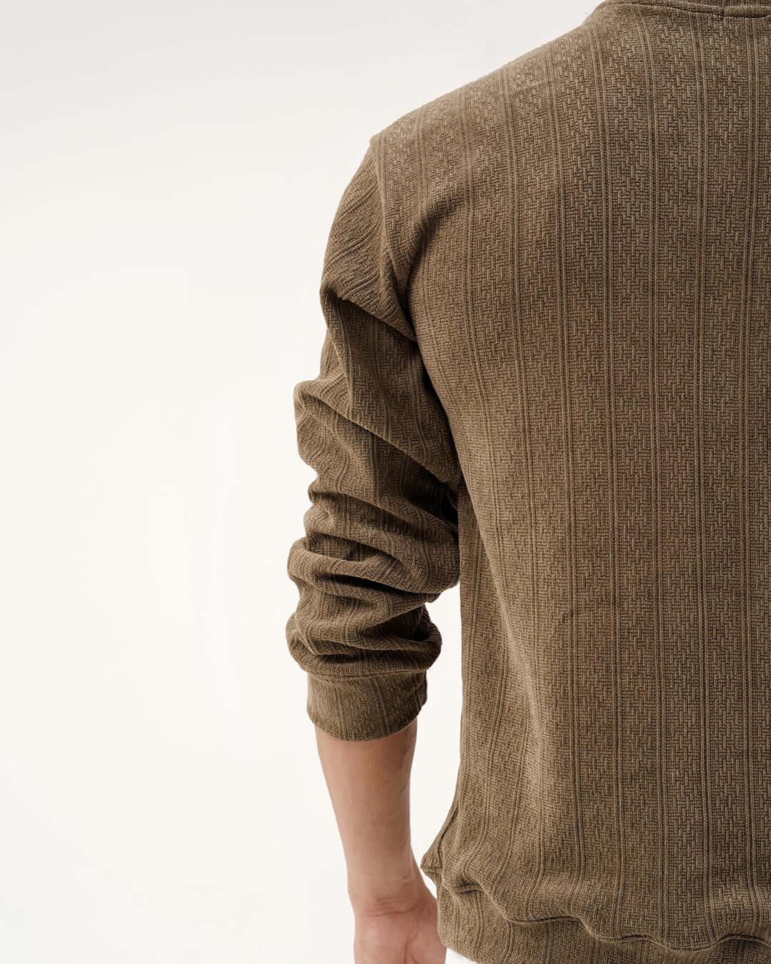 Back view of the Daily Luxe Jacquard Sweatshirt in Olive Grove showcasing its textured weave.