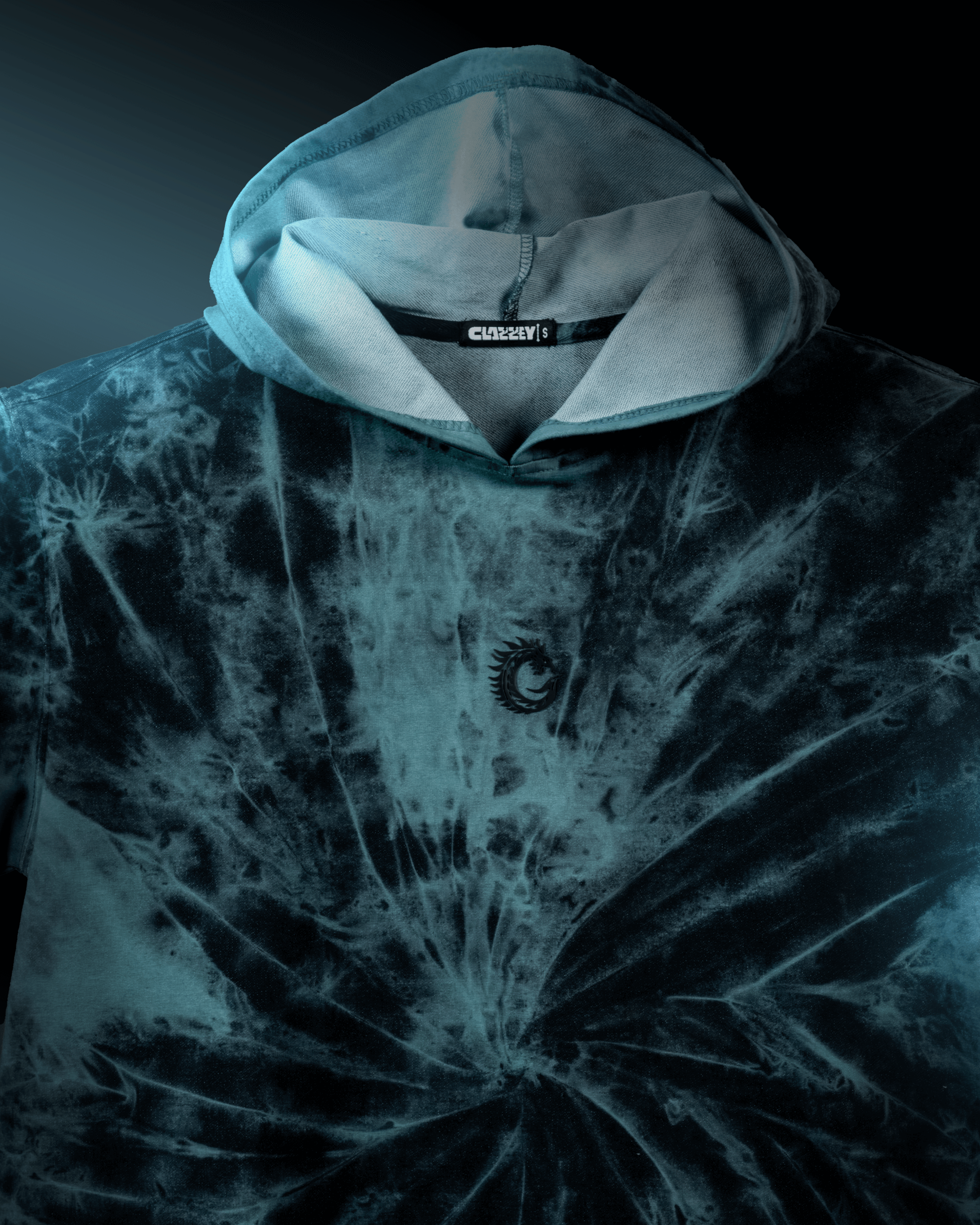 Stormcore Spiral oversized hoodie in dark tie-dye with hood and logo, showcasing urban streetwear style.