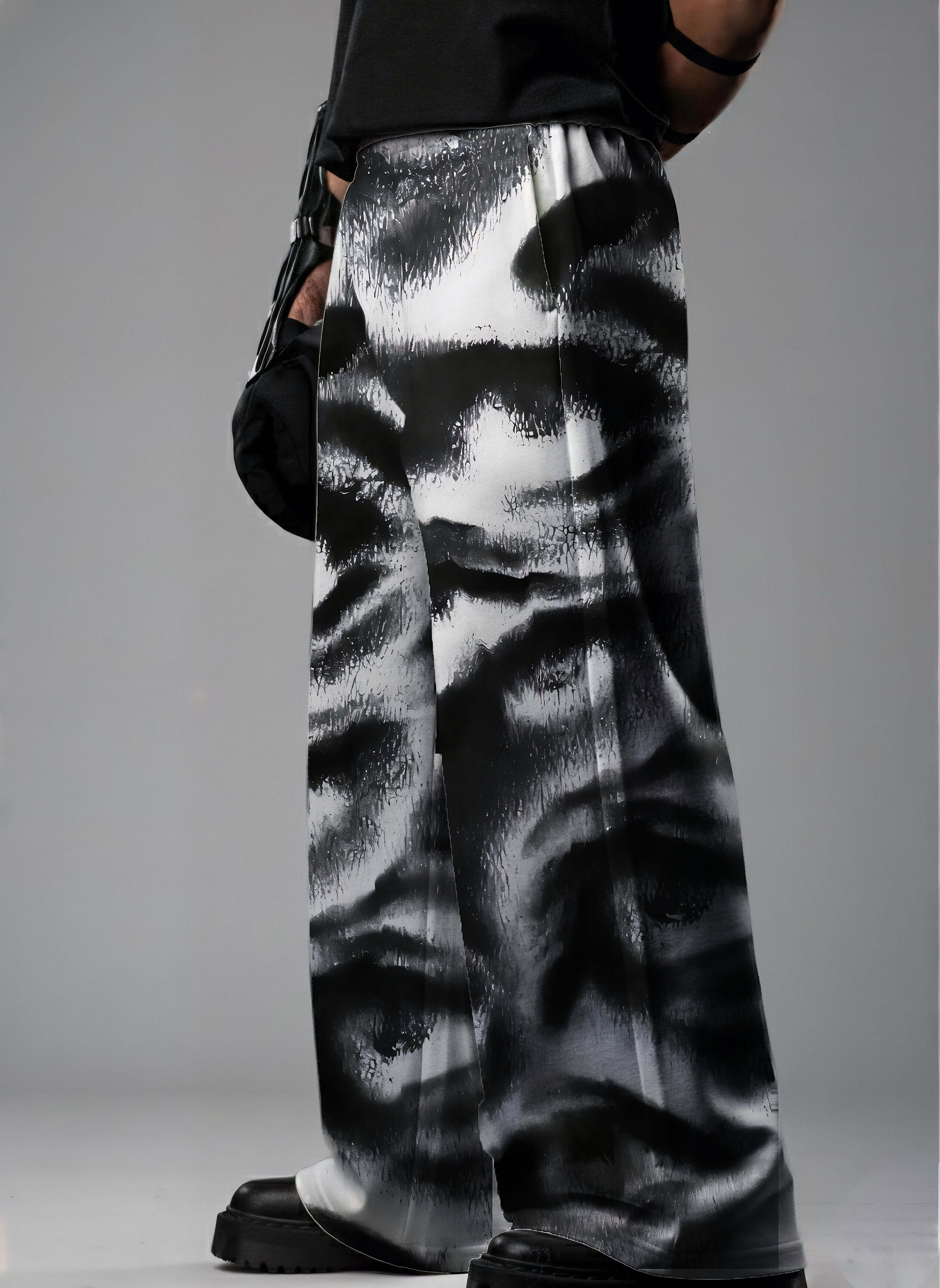 Noir Visage, Printed Baggy Pants, Black Baggy Pants, Monochrome Pants, Baggy Fit Pants, Streetwear Pants, Oversized Pants, Graphic Print Pants, Statement Pants, Urban Streetwear, Unisex Streetwear, Relaxed Fit Pants, Trendy Bottomwear, Contemporary Fashio