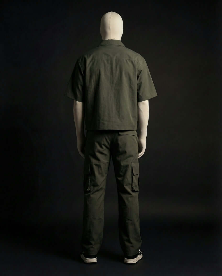 Olive Utility Zip Co-ord set displayed on a mannequin from the back, featuring a relaxed fit and cargo pockets.