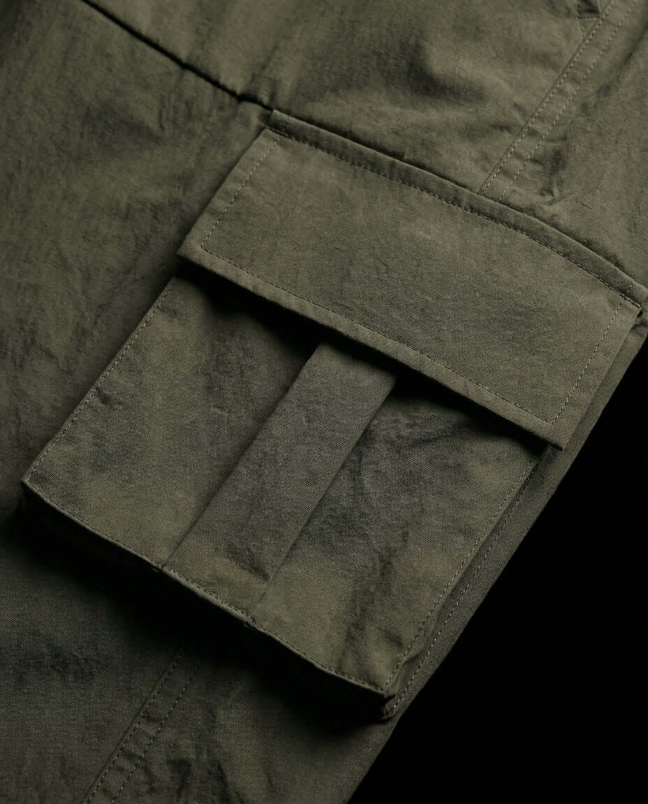 Close-up view of the pocket detail on the Olive Utility Zip Co-ord from the Tech-Nylon Series.
