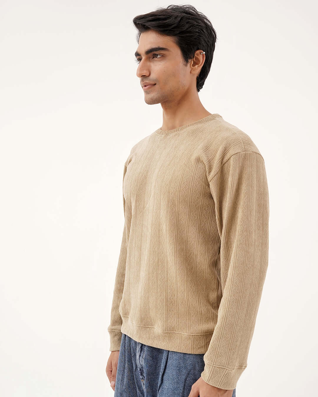 Daily Luxe Jacquard Sweatshirt – Desert Sand worn by a man, showcasing its soft jacquard texture and warm earthy color.