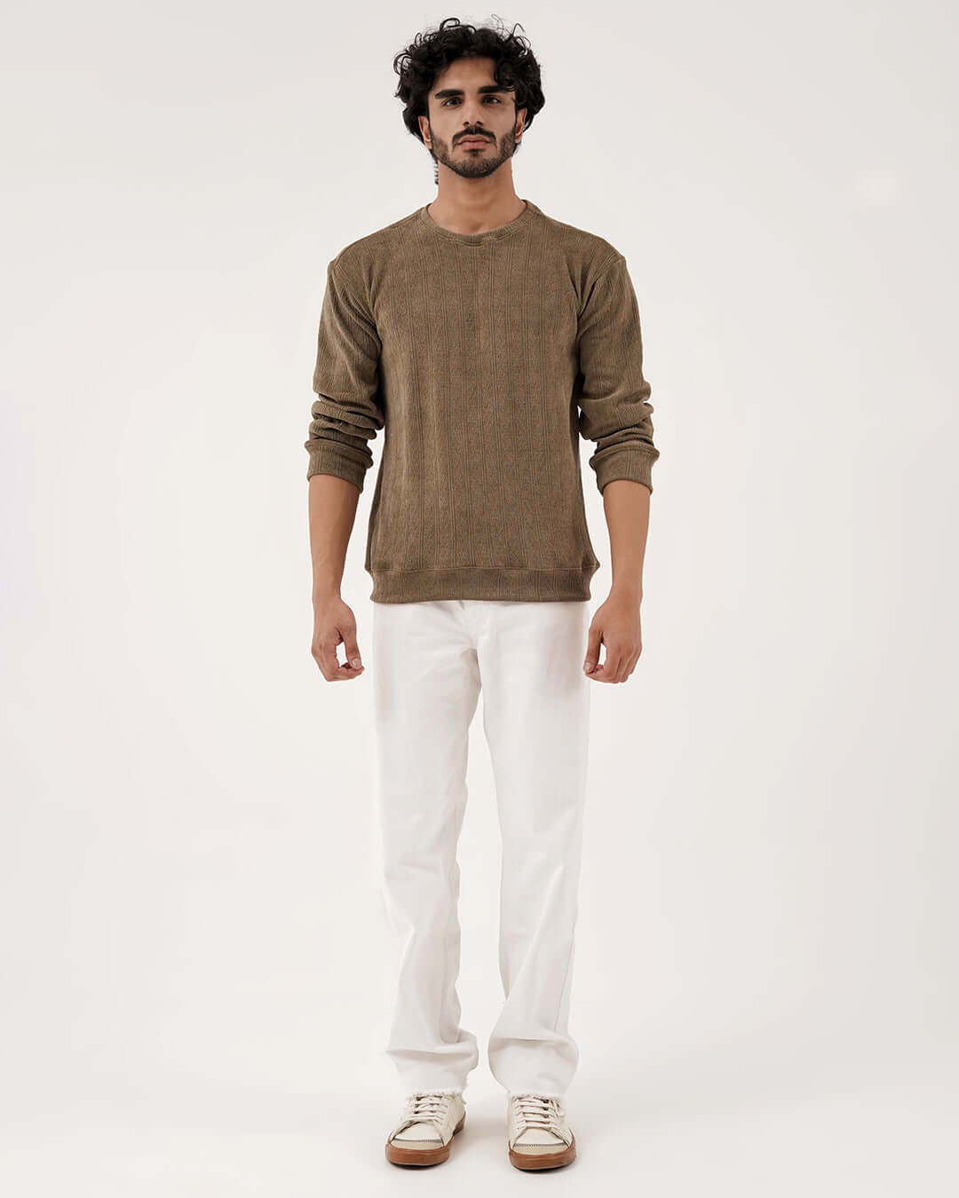 Man wearing the Daily Luxe Jacquard Sweatshirt in Olive Grove, showcasing premium streetwear style.