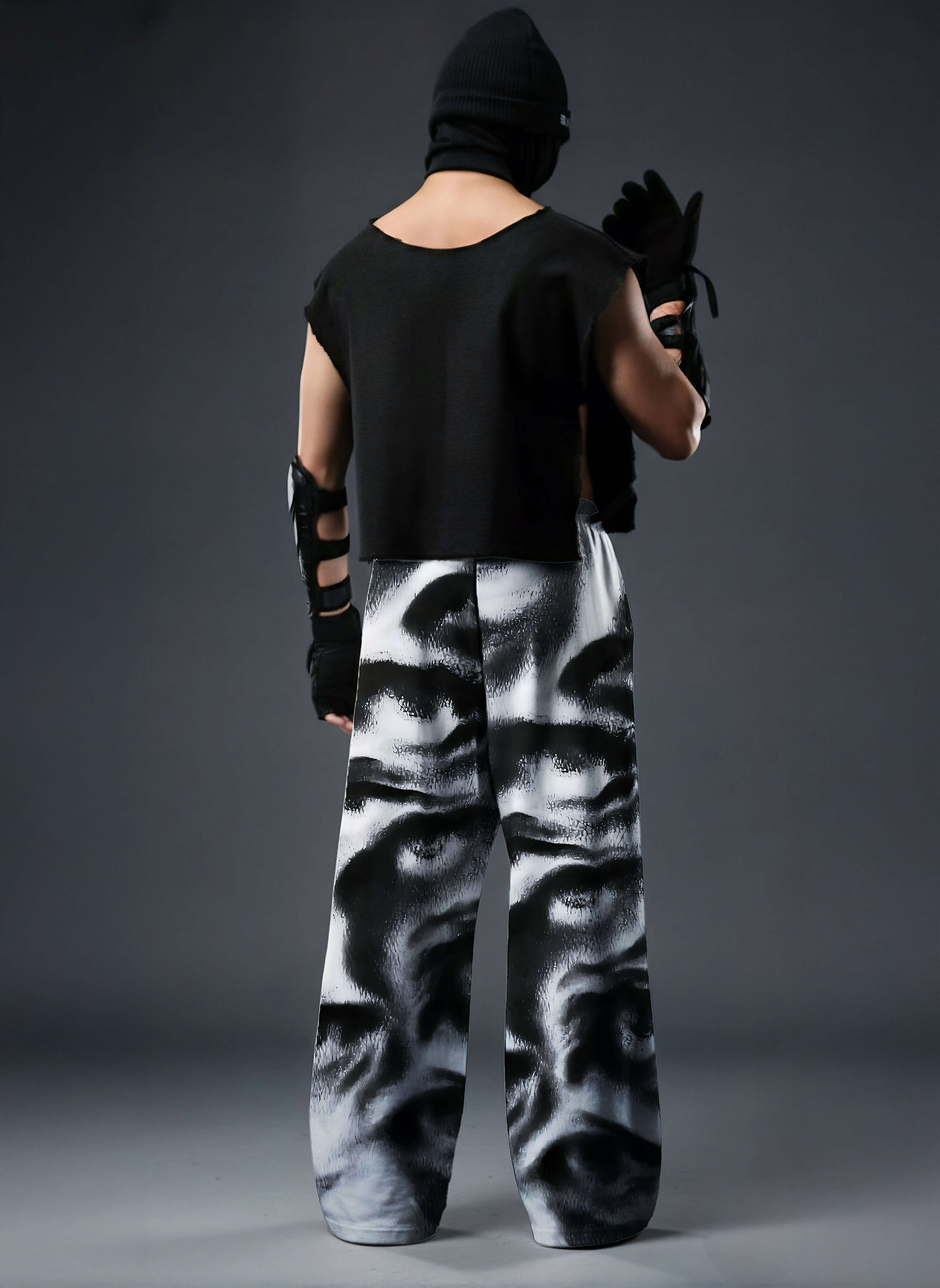 Noir Visage, Printed Baggy Pants, Black Baggy Pants, Monochrome Pants, Baggy Fit Pants, Streetwear Pants, Oversized Pants, Graphic Print Pants, Statement Pants, Urban Streetwear, Unisex Streetwear, Relaxed Fit Pants, Trendy Bottomwear, Contemporary Fashio
