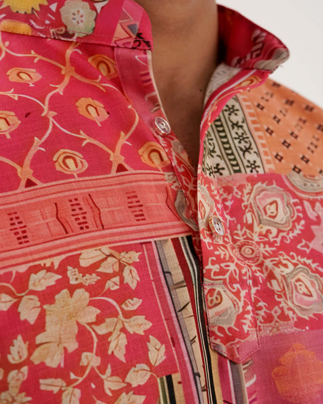 Close-up of the vibrant collar detail of the Festive Grace Short Kurta, showcasing its elegant ethnic design.