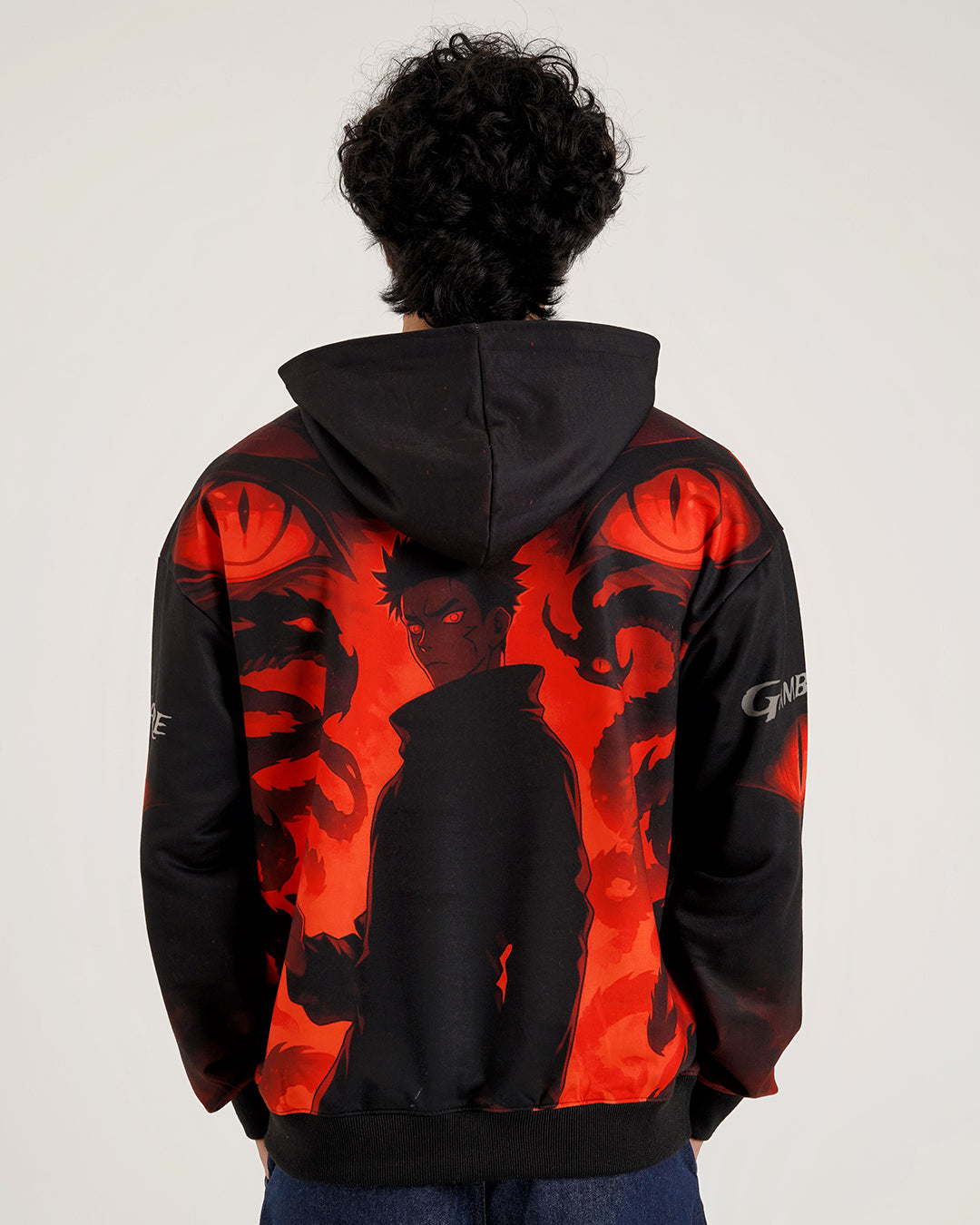 Back view of Gambare Anime Graphic Hoodie showcasing vibrant red and black dragon motifs.