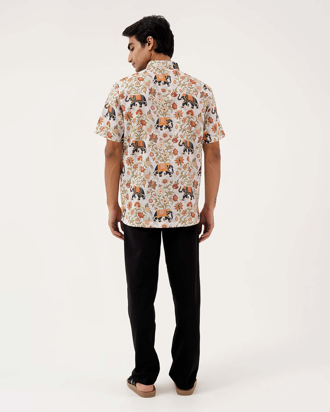 Golden Dynasty Short Kurta featuring vibrant elephant motifs and a stylish back view model.