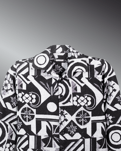 Graphic Illusion Shacket with black and white jacquard pattern, showcasing a stylish full-sleeve design and classic collar.