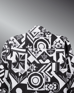 Graphic Illusion Shacket with black and white geometric pattern on a gray background, showcasing stylish design and texture.