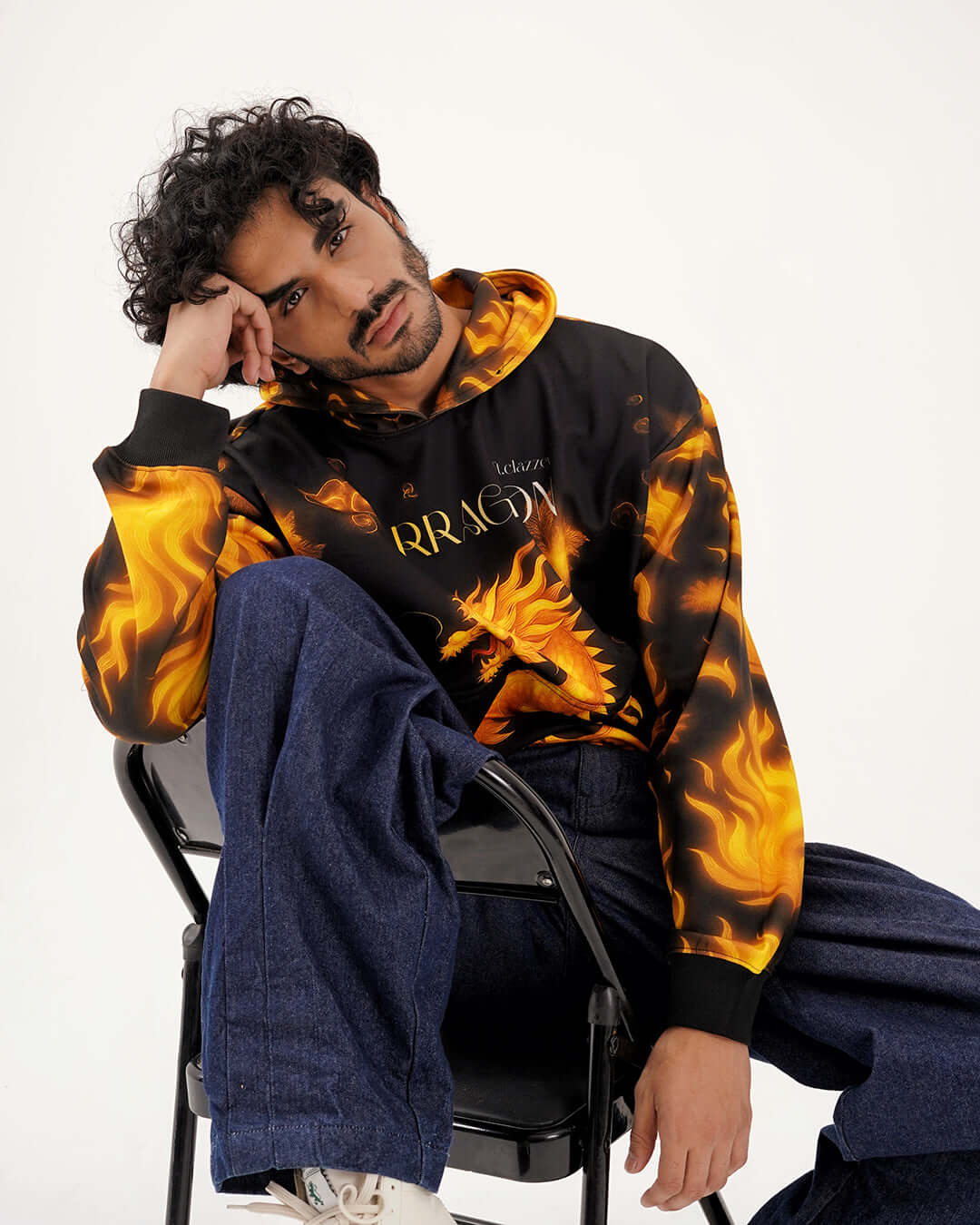 Model wearing the Inferno Dragon Graphic Hoodie, showcasing its striking flame design and bold mythical theme.