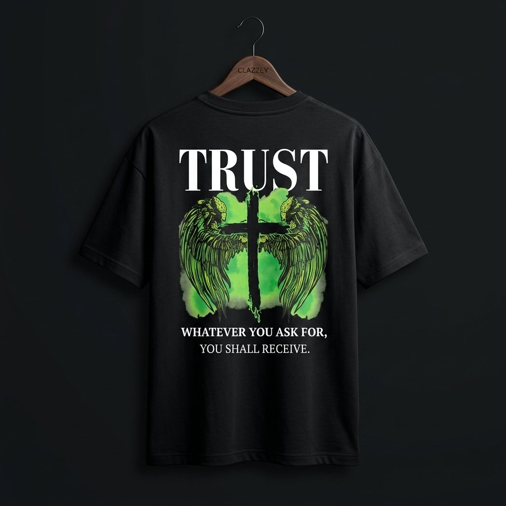 Back of black oversized tee with large TRUST text, green winged cross and quote
